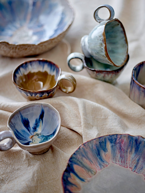 Manela Glass