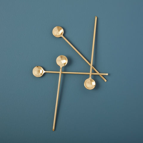 Longues cuillères fines dorées